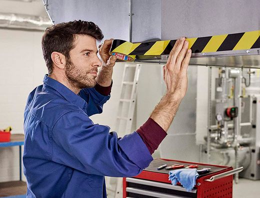 Cinta adhesiva tesa de seguridad amarilla y negra polipropileno 66 mt x 50 mm