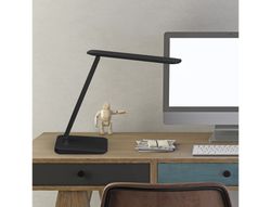 Lampara de escritorio maul led 2,7w 325lm luz ajustable panel tactil brazo giratorio negra